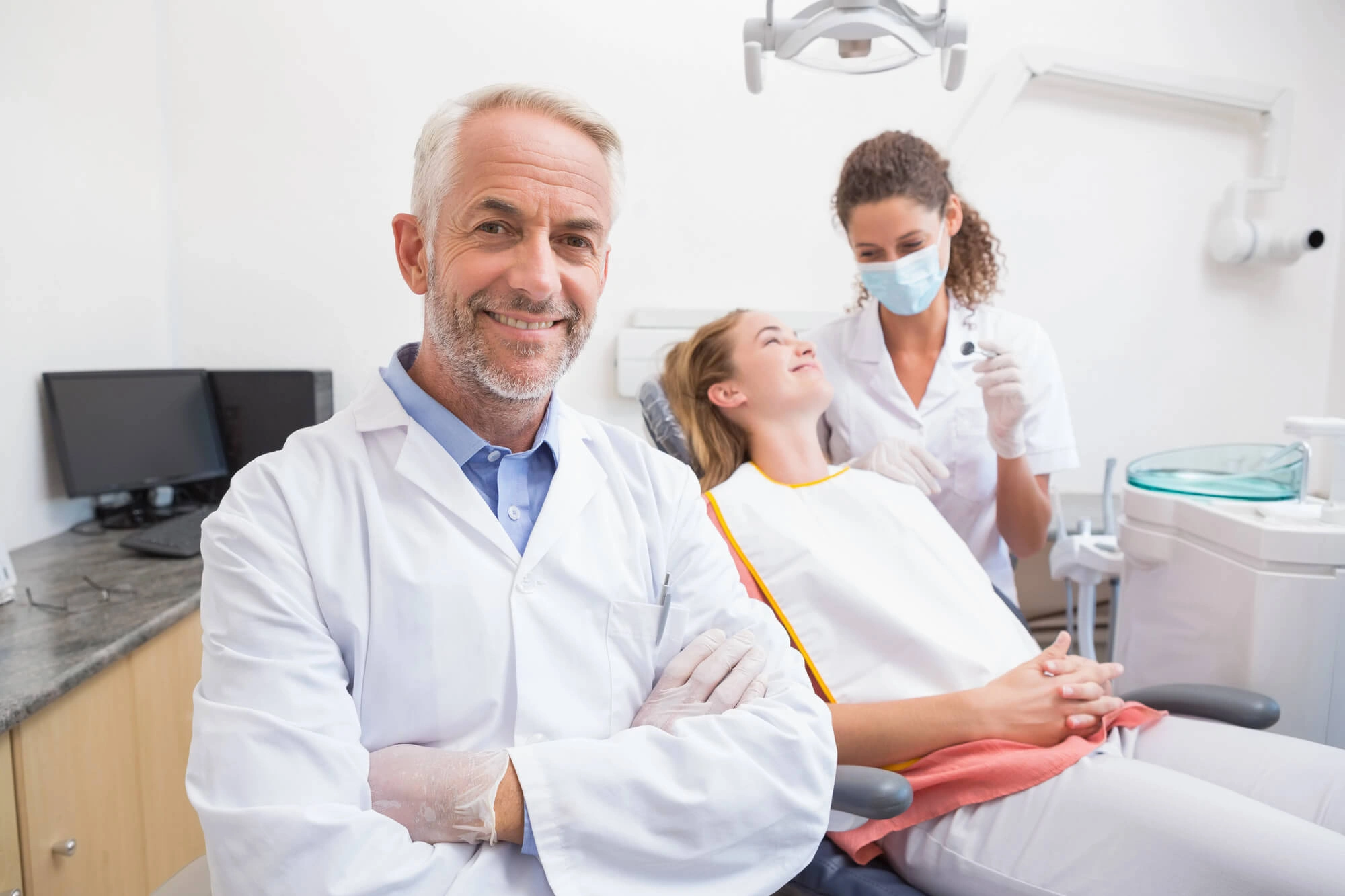 Dentist smiling at dental office auburn al
