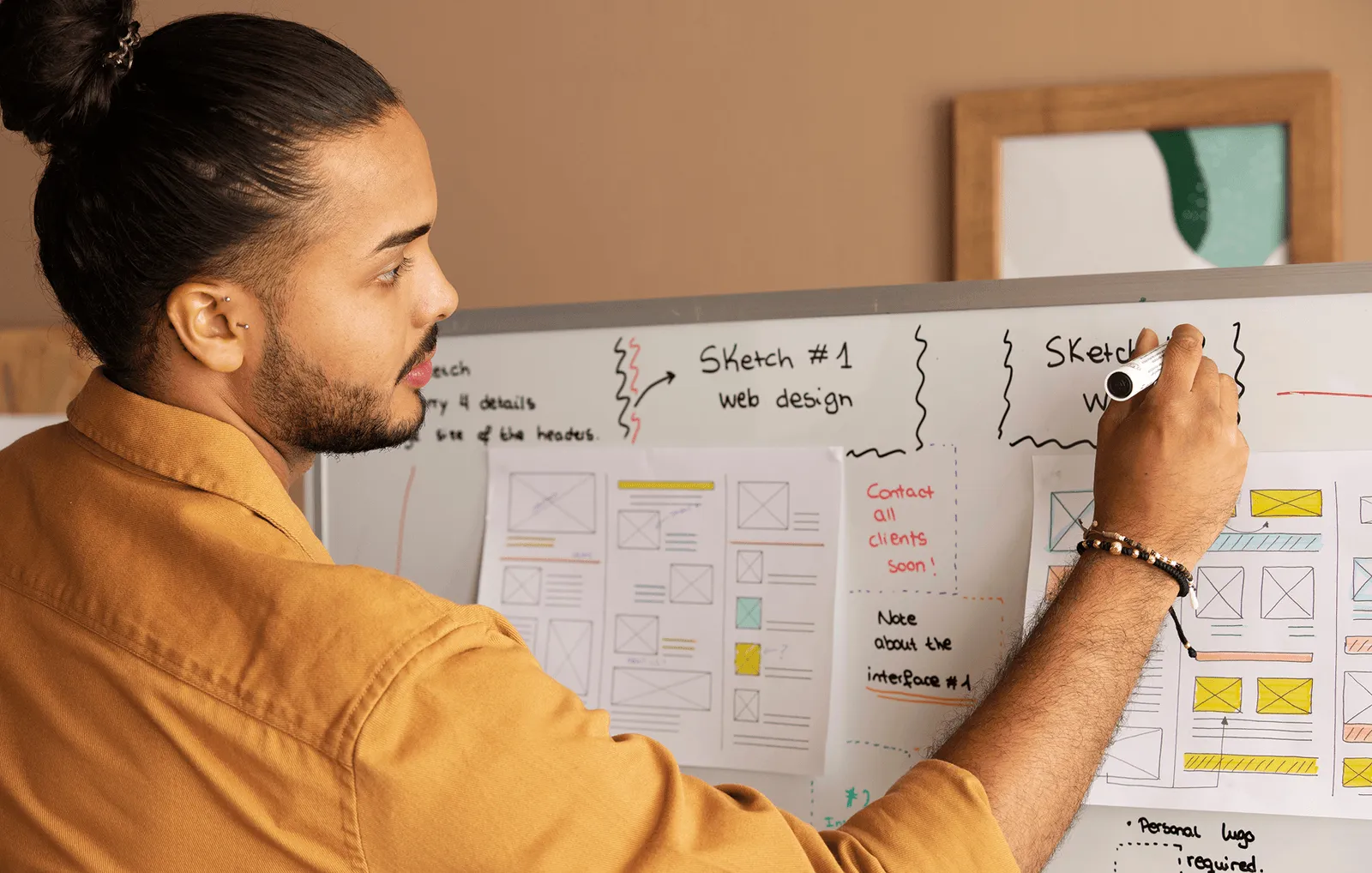 a man studying about UI design & visual systems