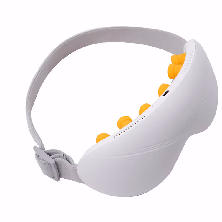 Dispositivo blanco con banda ajustable y múltiples nodos amarillos para masaje o terapia en cabeza.