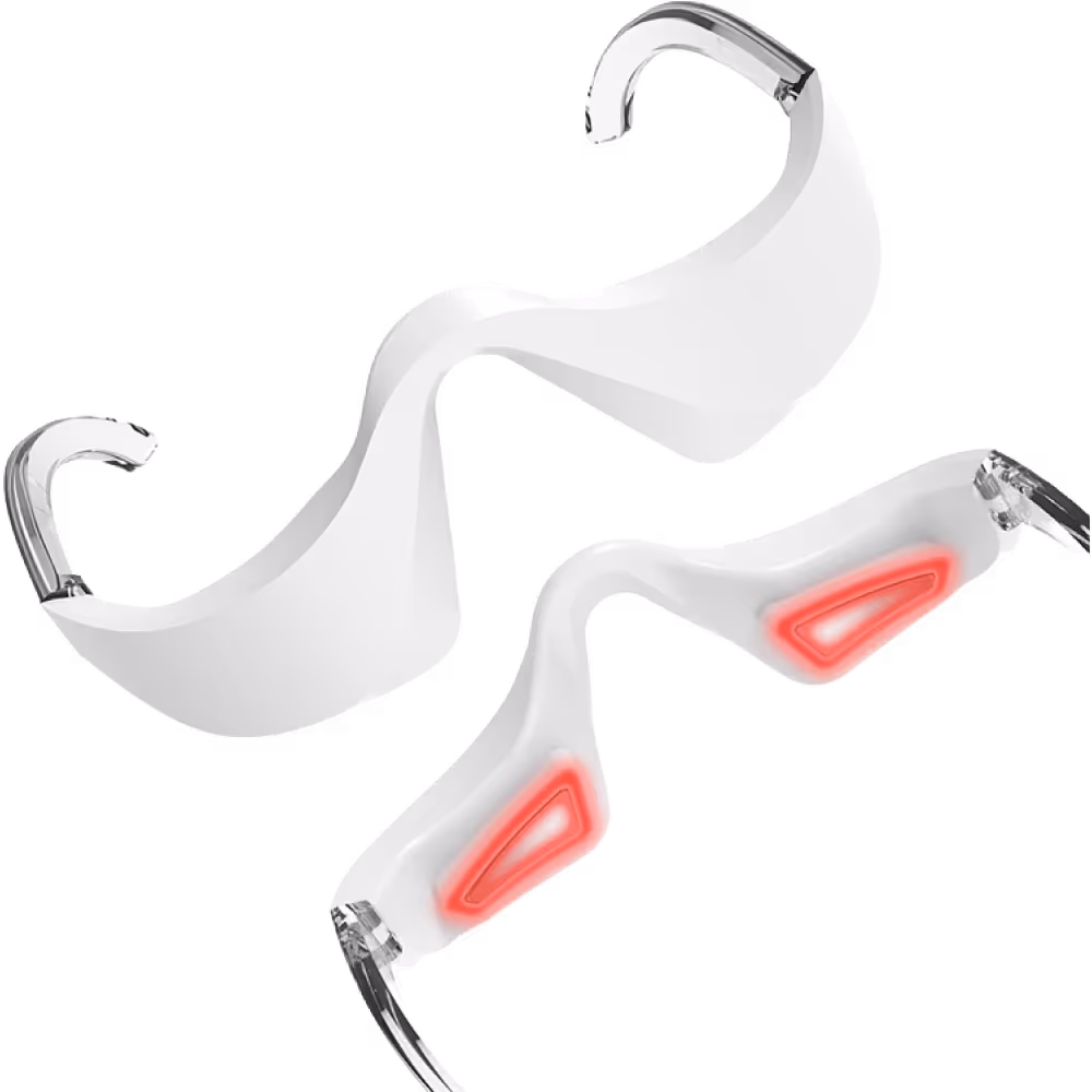 Dispositivo blanco para cuidado ocular con áreas iluminadas en rojo, diseñado para usarse alrededor de los ojos.
