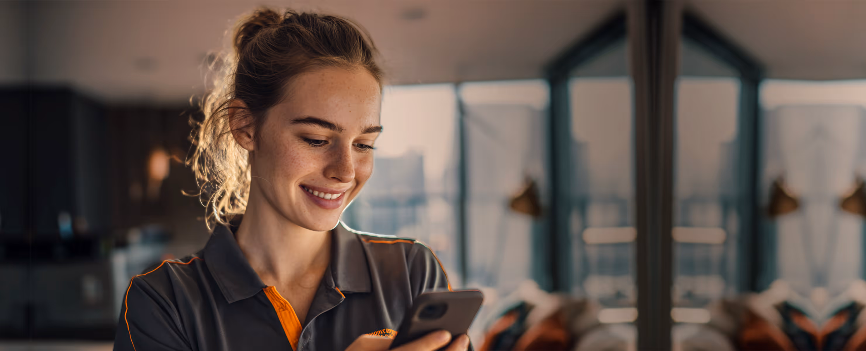 happy housekeeper checking her task todo app