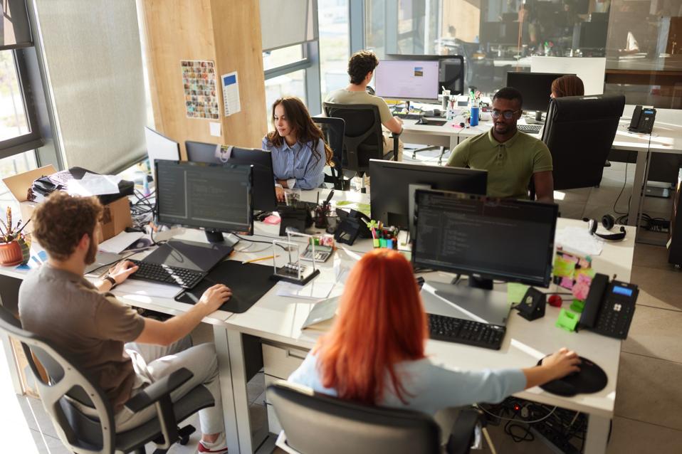 Overhead shot of people working at an office