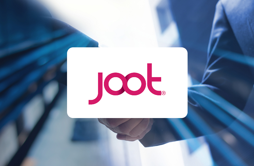 Upwards shot of two people shaking hands