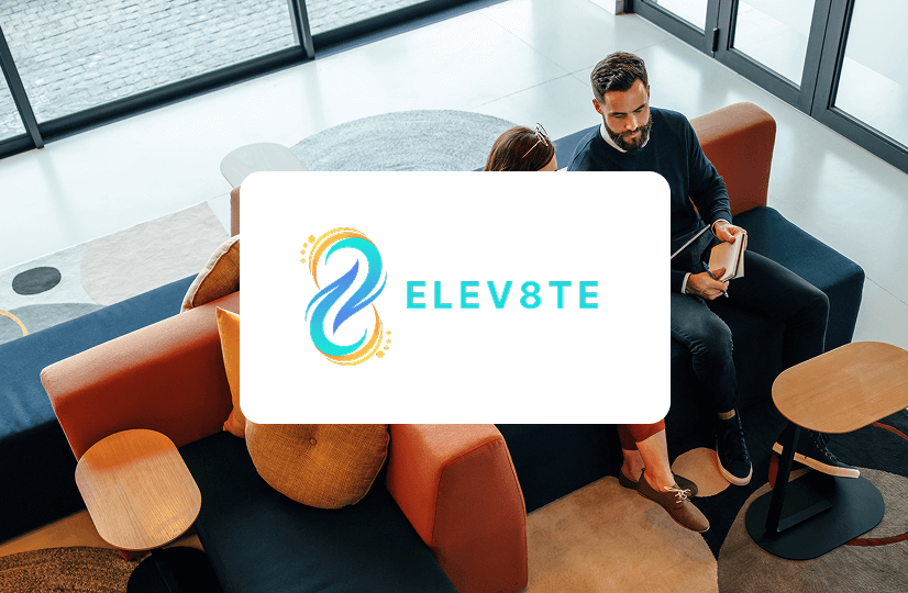 High angle view of two business colleagues working in a lobby