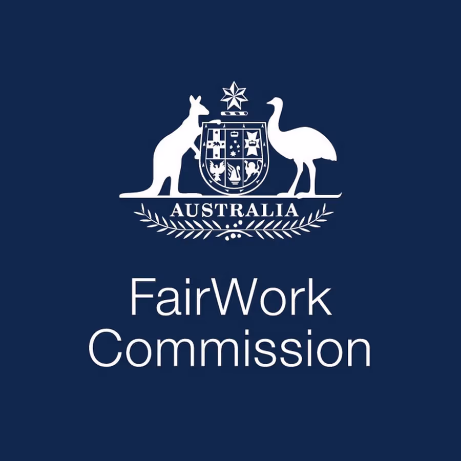 Australia coat of arms with kangaroo and emu above the text 'FairWork Commission' on a dark blue background.