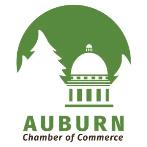 Green Auburn Chamber of Commerce logo featuring a dome building and pine trees.