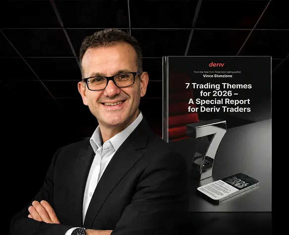 Vince Stanzione standing beside the cover of his ebook titled '7 Trading Themes for 2026 – A Special Report for Deriv Traders'