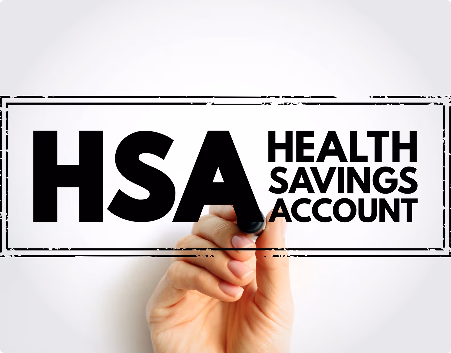 Hand holding black marker, writing 'HSA Health Savings Account' inside a rectangular frame.