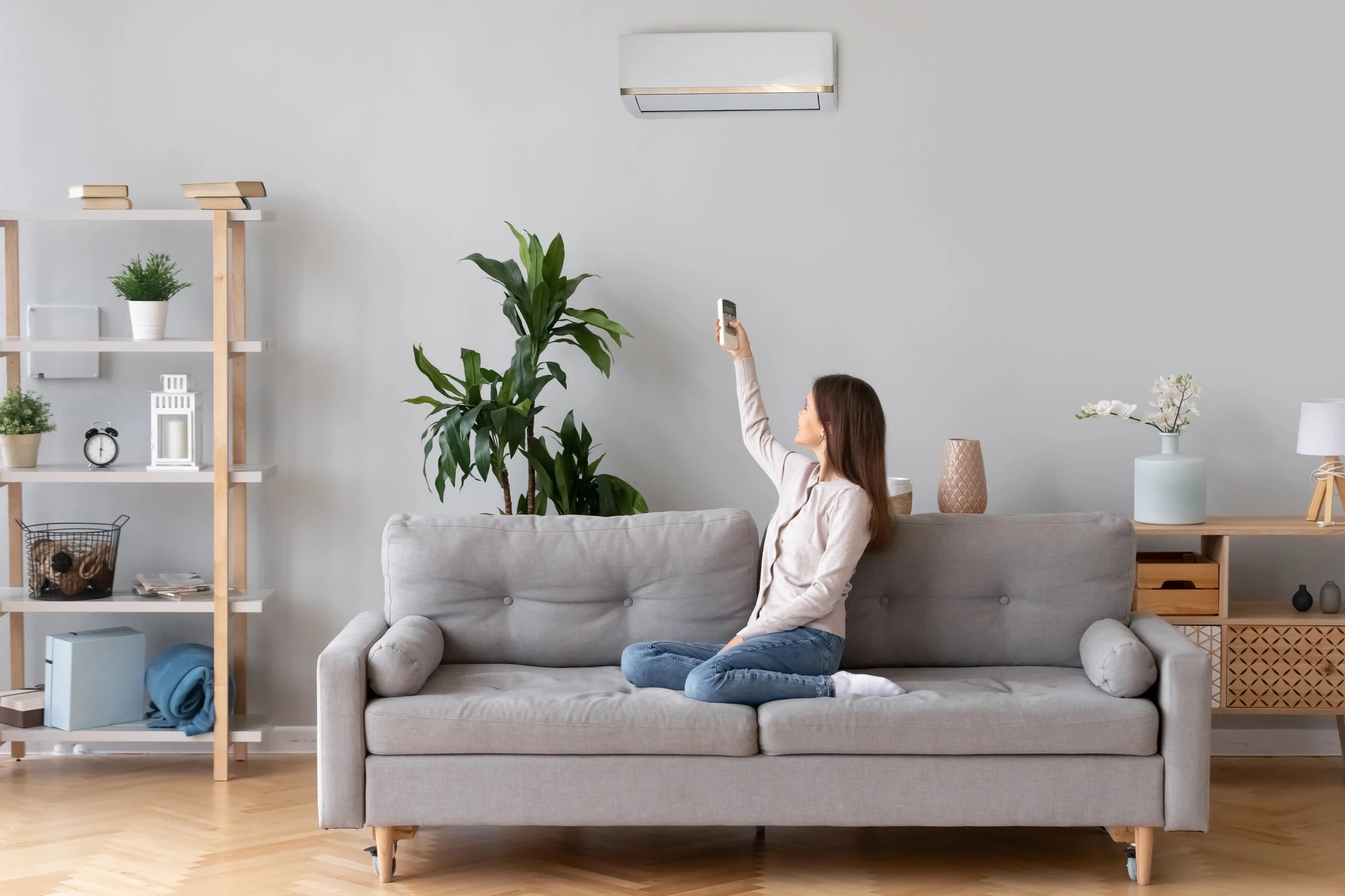 woman enjoying AC after AC maintenance near me
