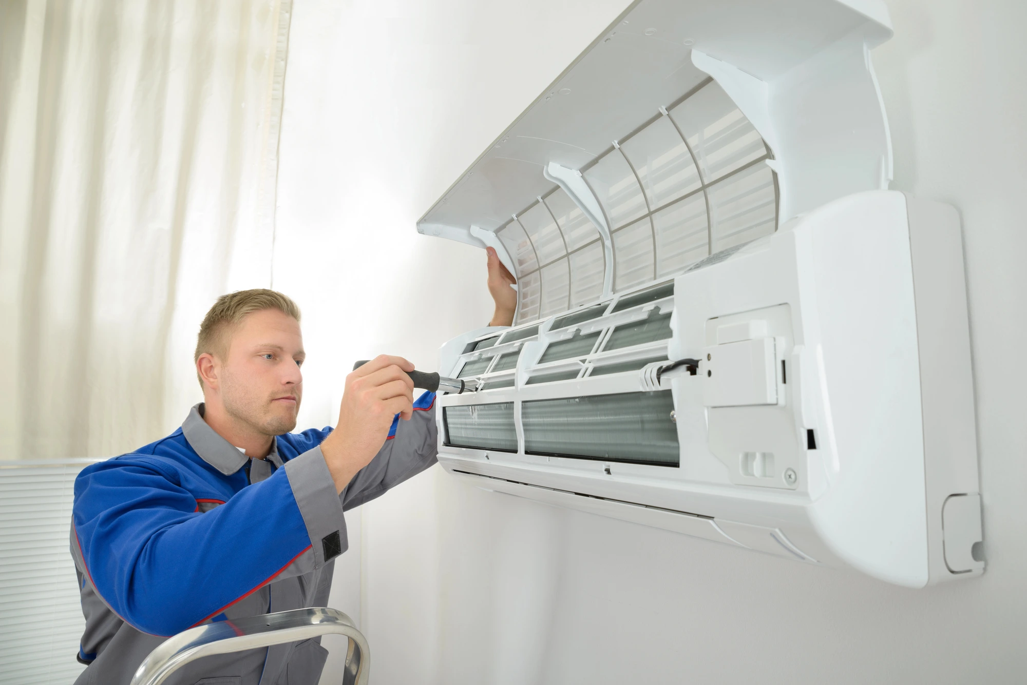 expert during an AC maintenance near me