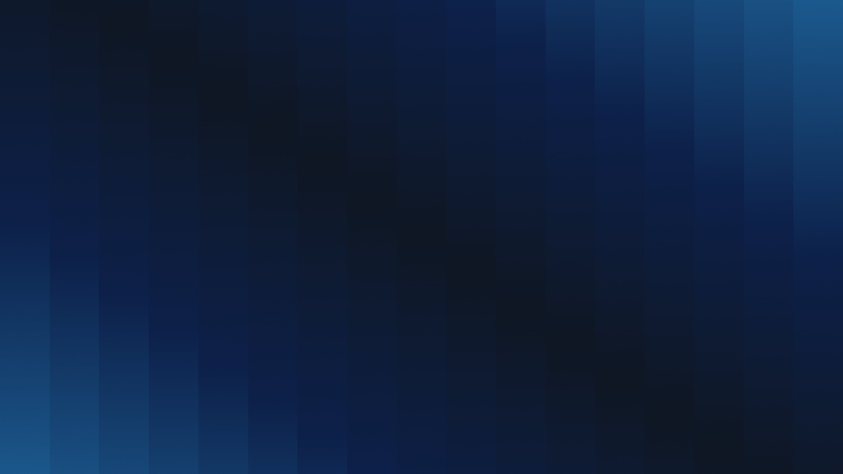 Abstract vertical blue gradient with varying dark to light shades.