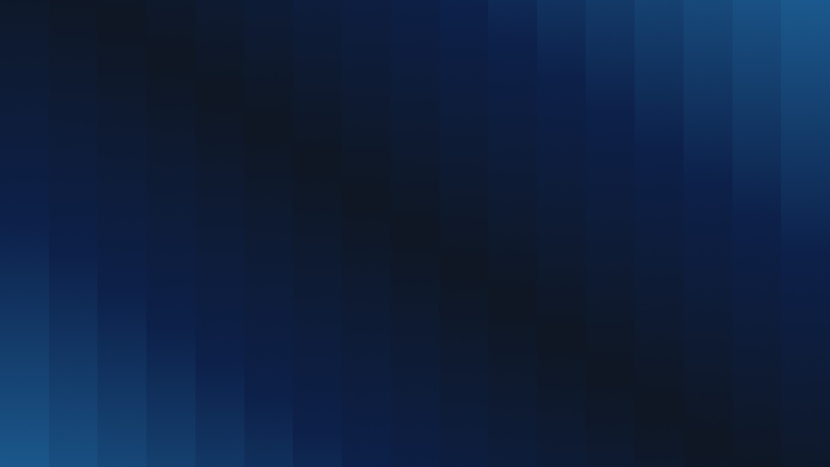 Abstract vertical blue gradient with varying dark to light shades.