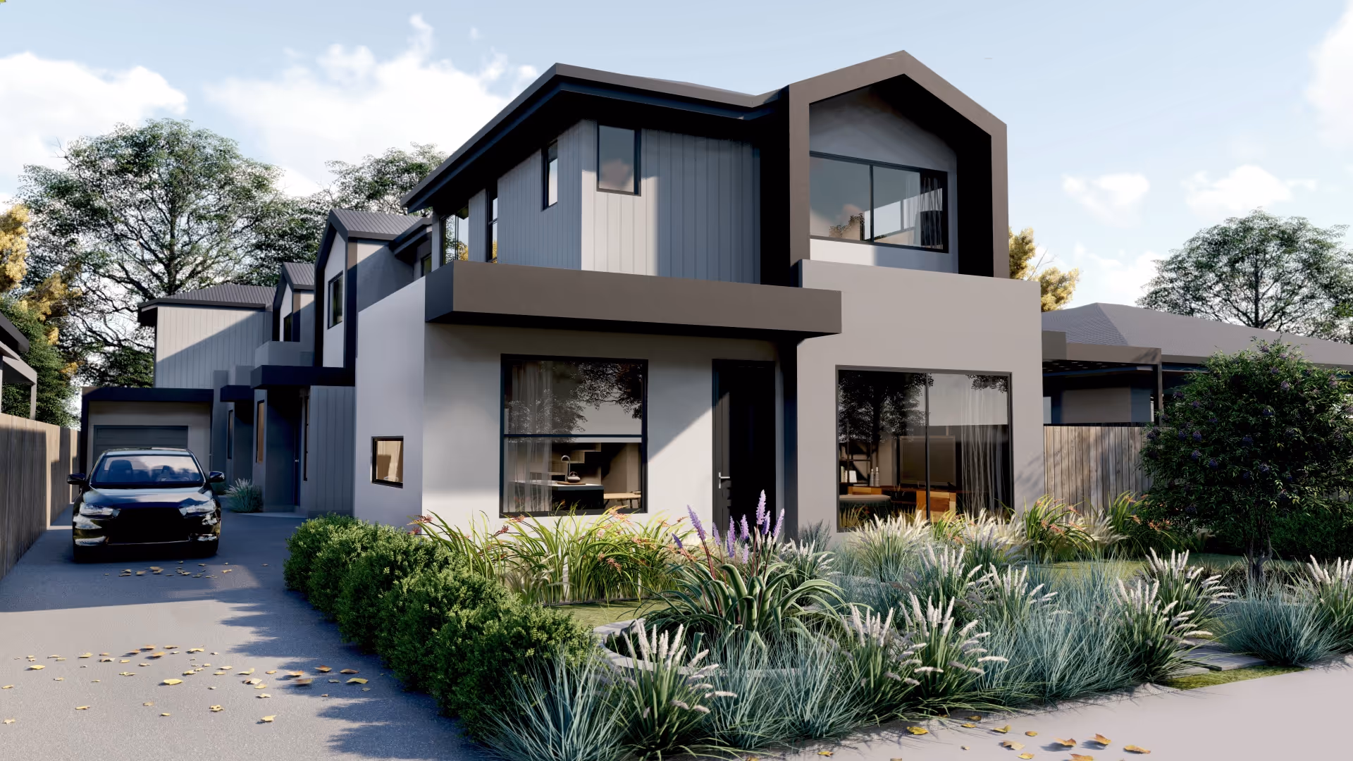 Modern two-story house with gray and white exterior, large windows, landscaped front yard, and black car parked in driveway.