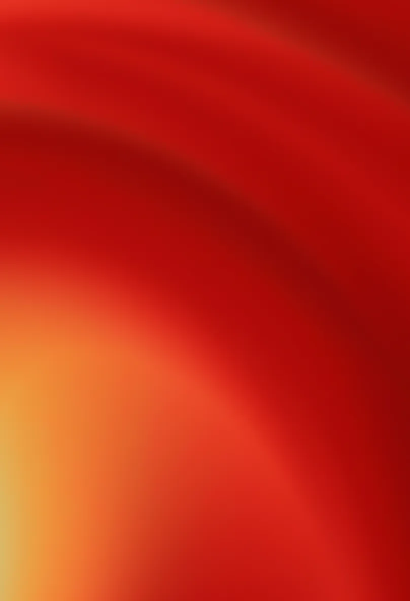 Abstract background with smooth gradient blending from yellow to dark red.