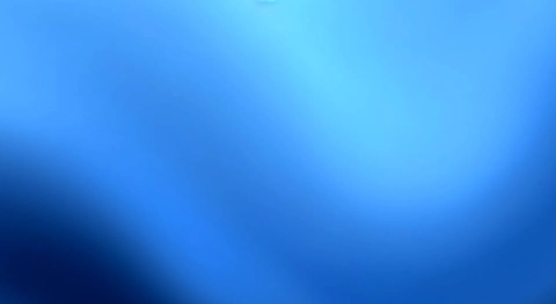 Abstract gradient background with varying shades of blue blending smoothly.