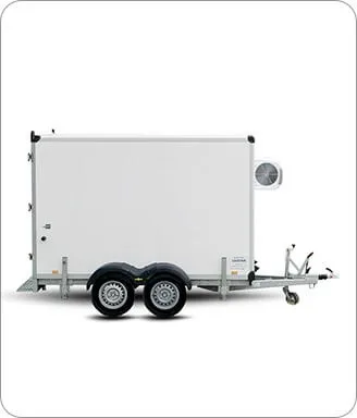 White enclosed dual-axle trailer with ventilation unit on the front side, isolated on white background.