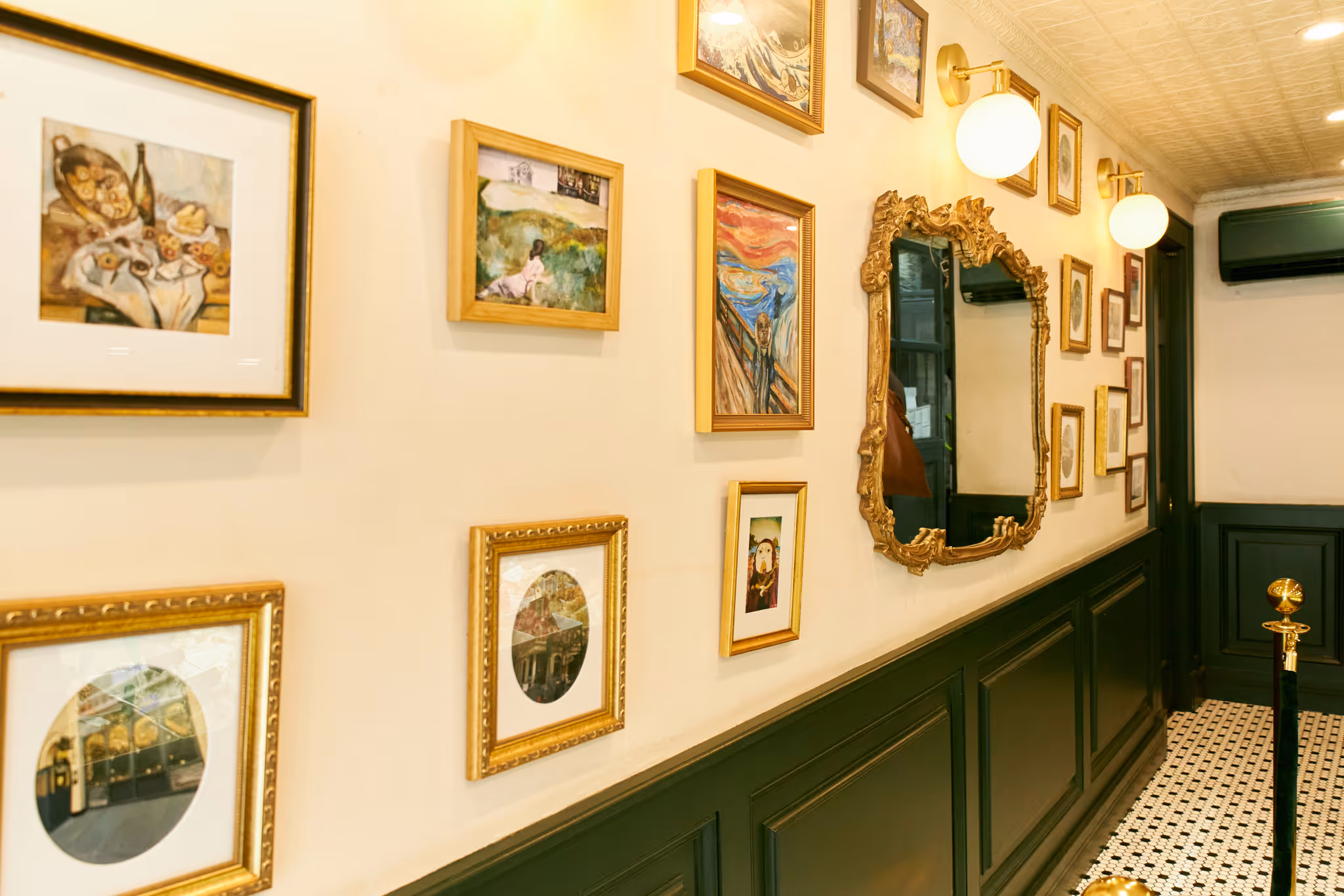 a gallery wall at the Bagel Pub at Sunset Park