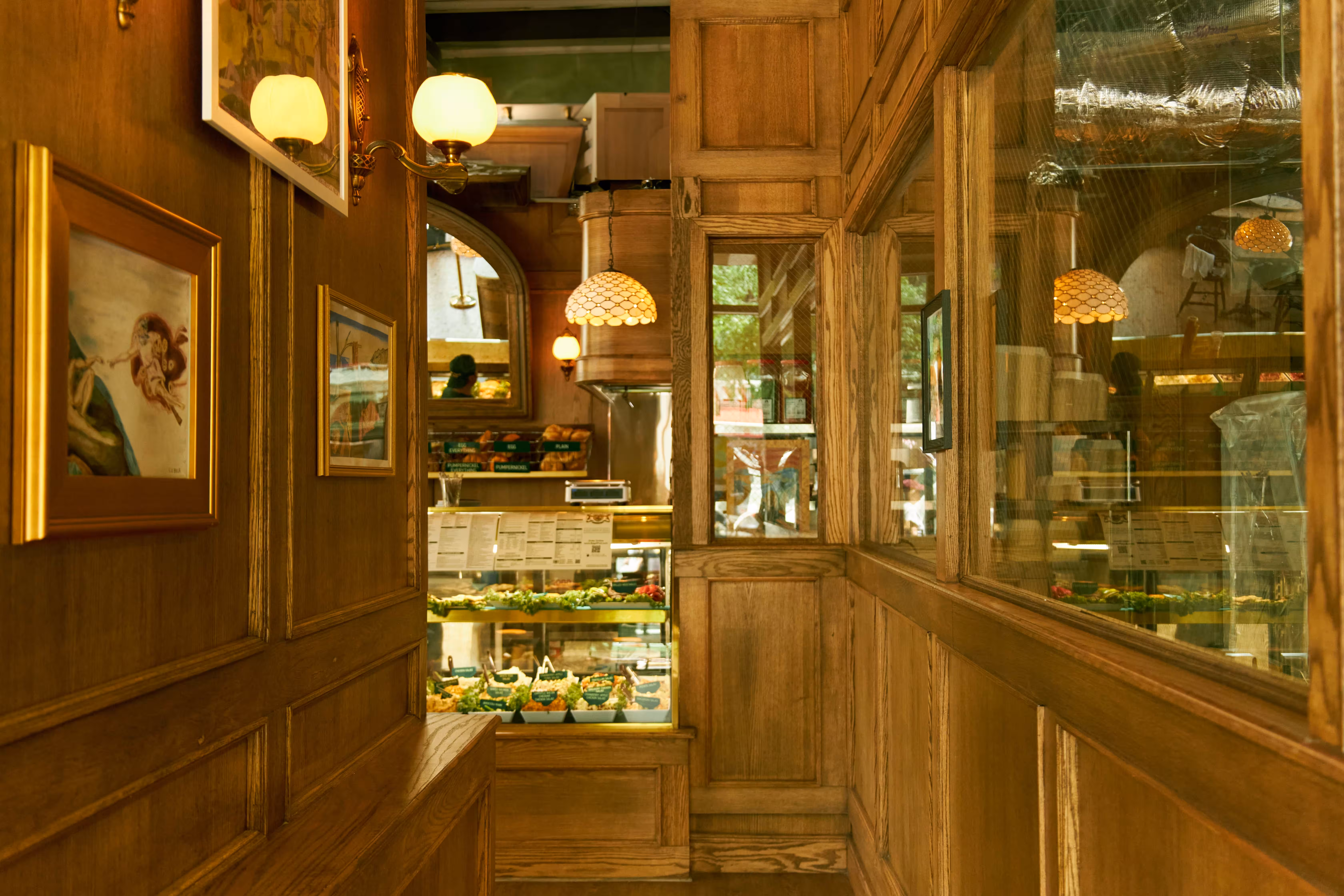a luxurious wooden interior of the BagelPub NoMad location