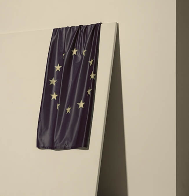 A blue flaf with the EU stars displayed on it
