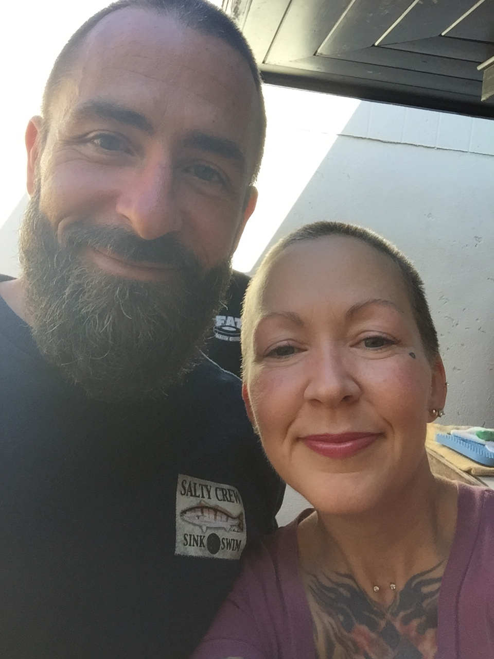 Jana Van Dyck and her husband outdoors in the sunshine