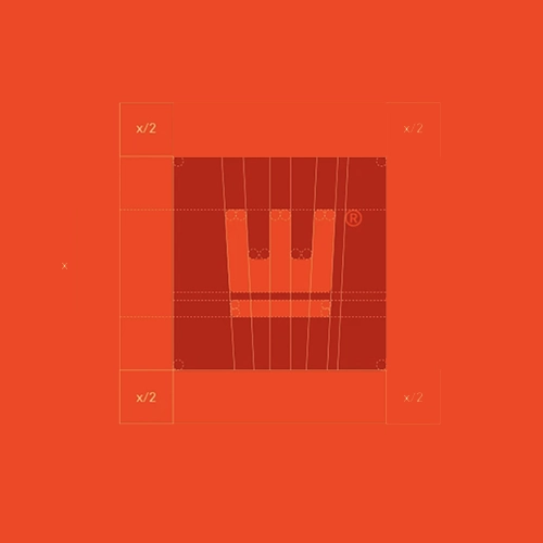 Hand holding fork over colorful plated meal.