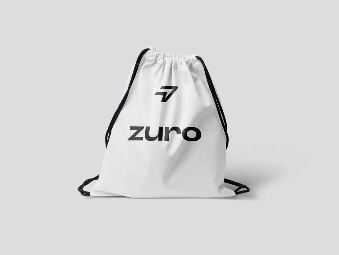 White drawstring gym bag with Zuro logo in black.