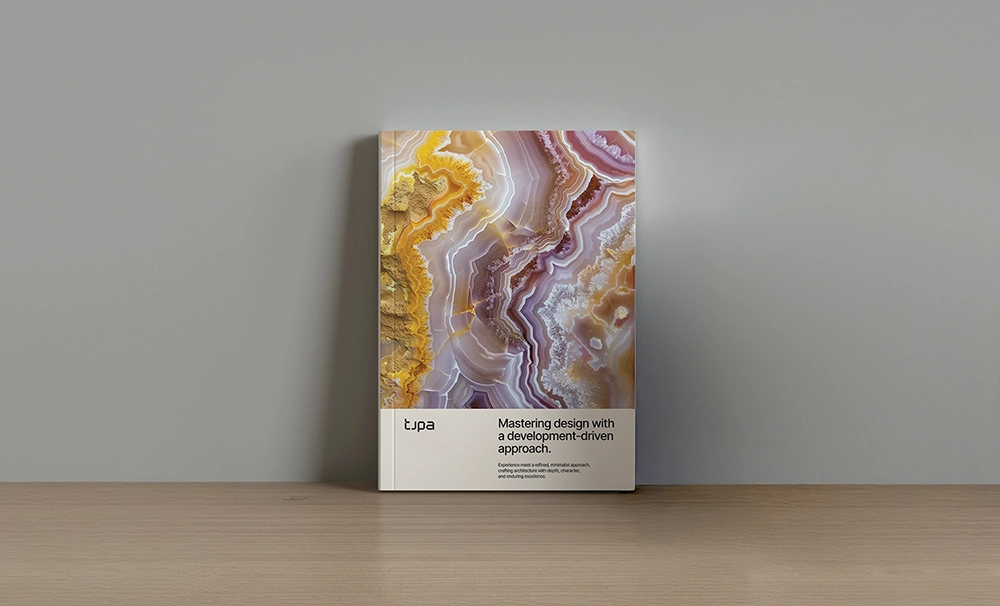 Branded magazine cover for TJPA with abstract geological texture.