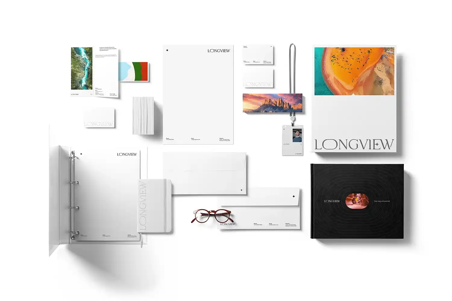 Collection of branded office stationery and printed materials.