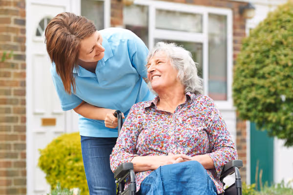 Young boy with learning disability smiles having fun