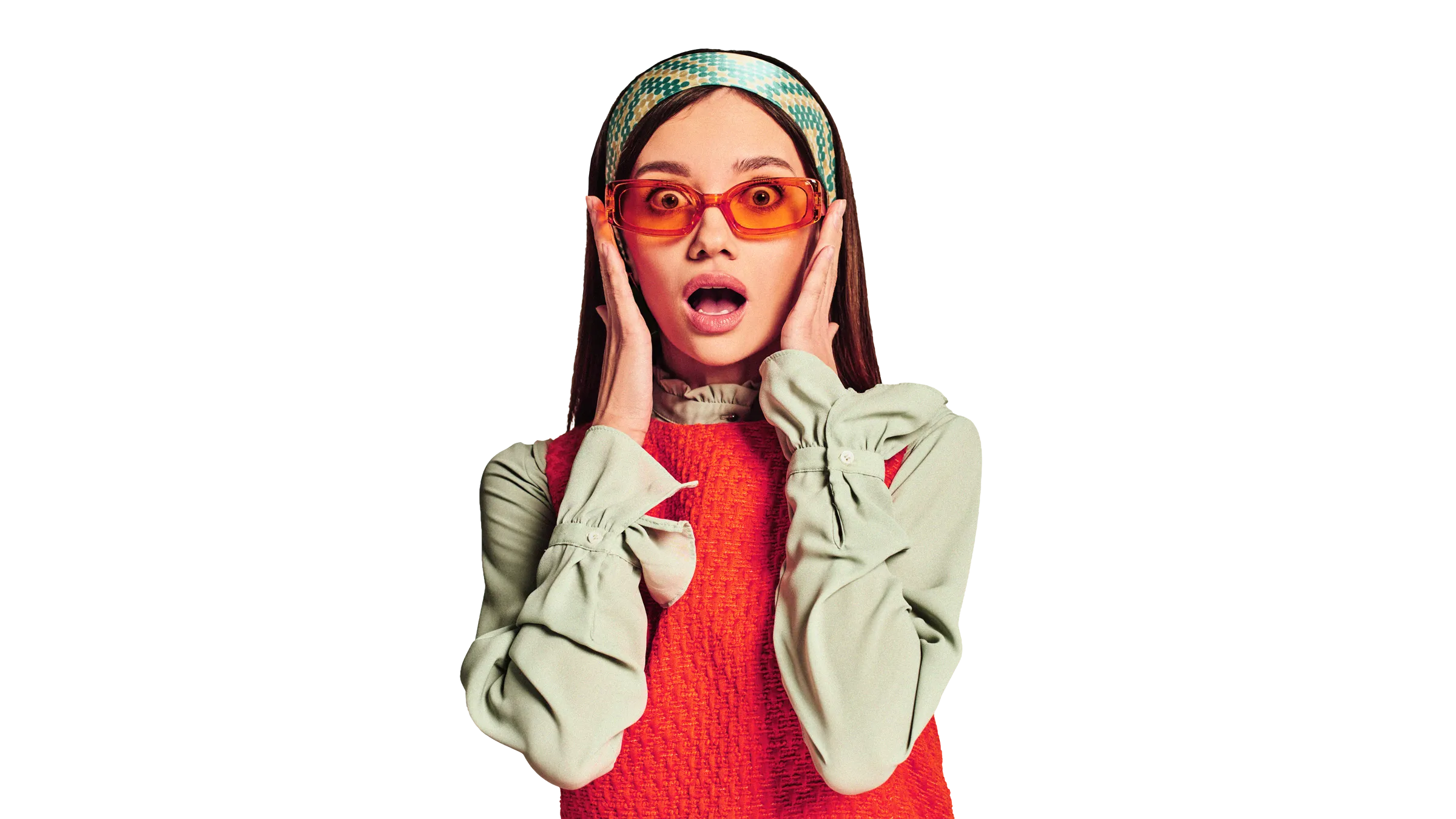 Surprised young woman wearing orange sunglasses, a patterned headband, and a red textured vest over a light green blouse.