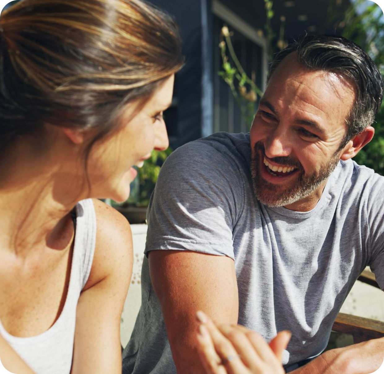 Couple talking while watching sunset