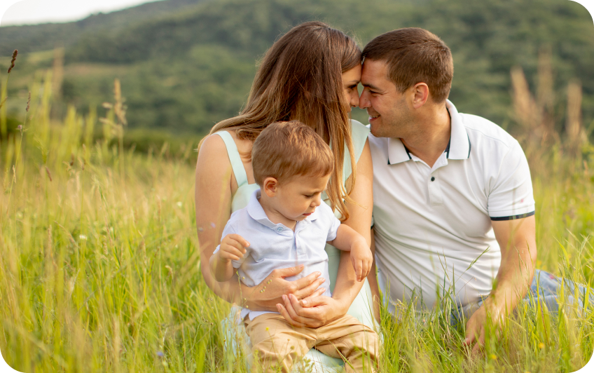 Parents holding their child while talking