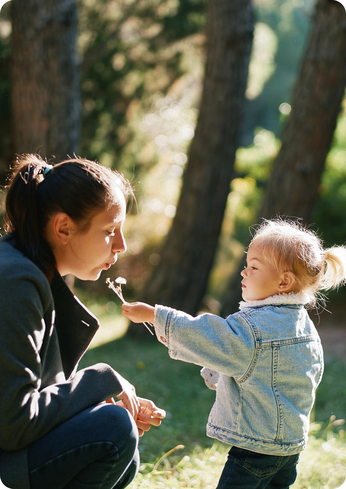 Mother and daughter playing outside