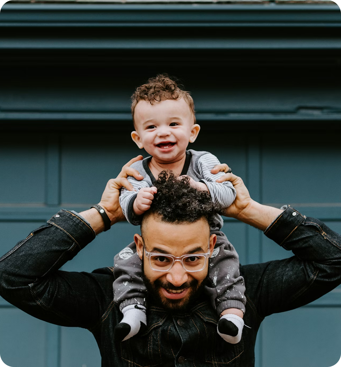 Father carrying his son