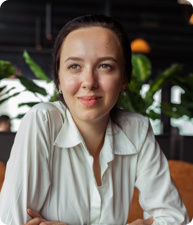 Woman smiling in a cafe