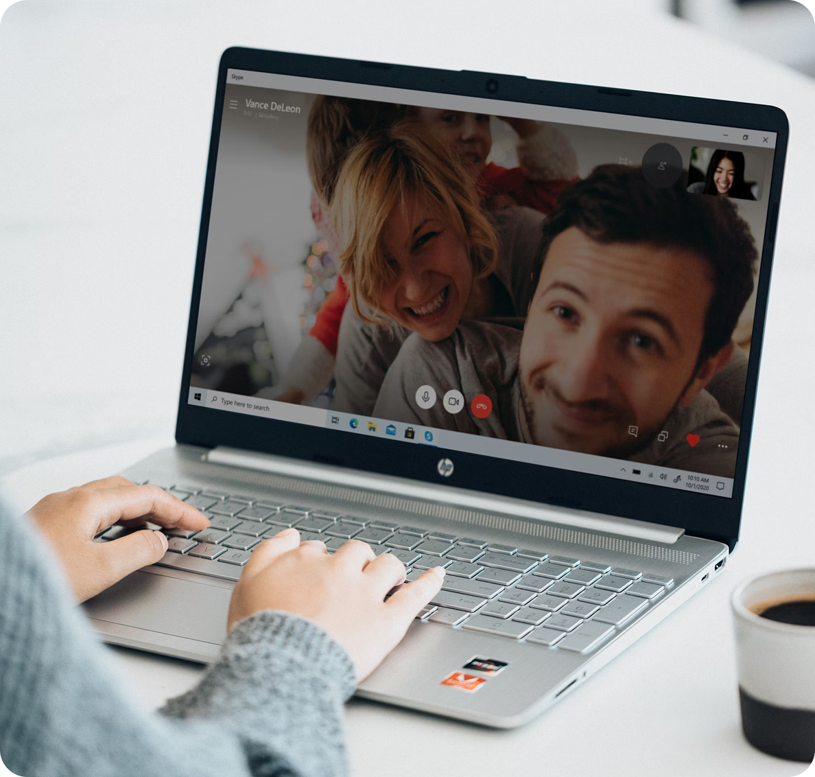 People doing video call on a laptop
