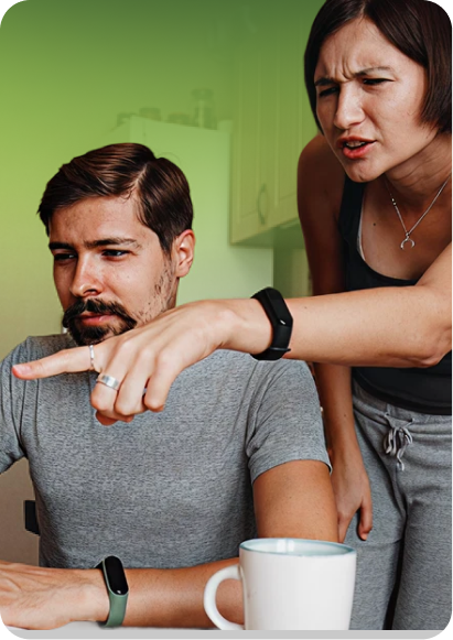 Women pointing at a laptop nad discussing something with a man