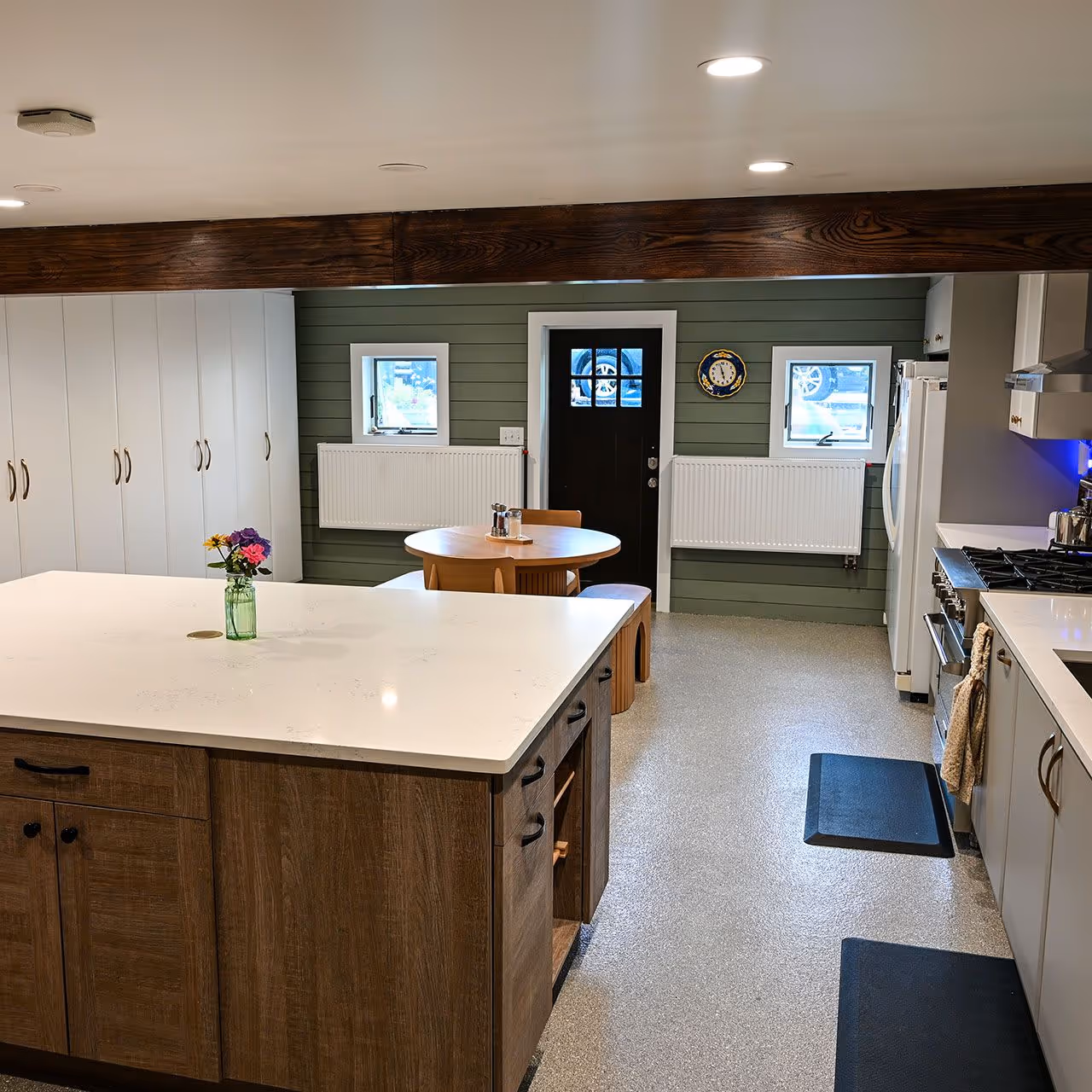 Modern kitchen remodel with custom cabinets and countertops by Roth Custom Solutions