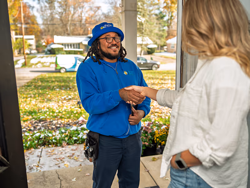 tech greeting a customer in ohio