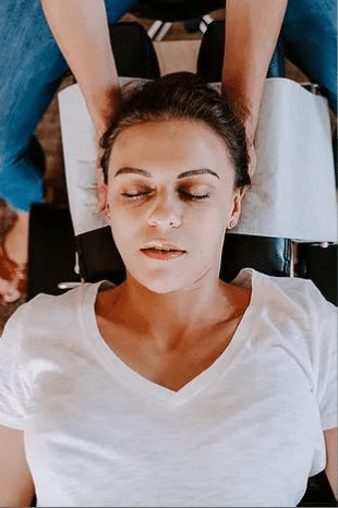 Woman on her back getting adjusted