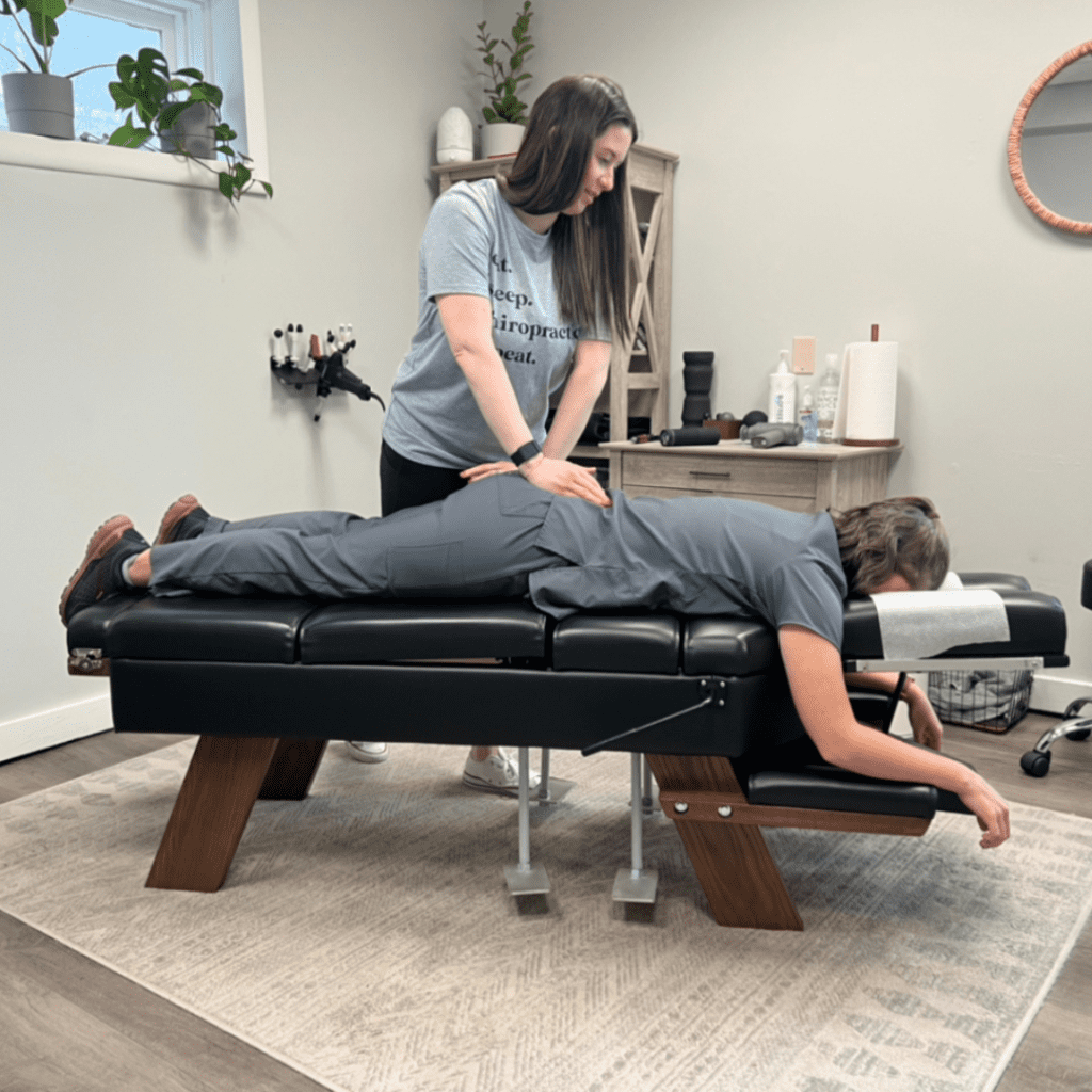 Dr. Nicole Adjusting a patient