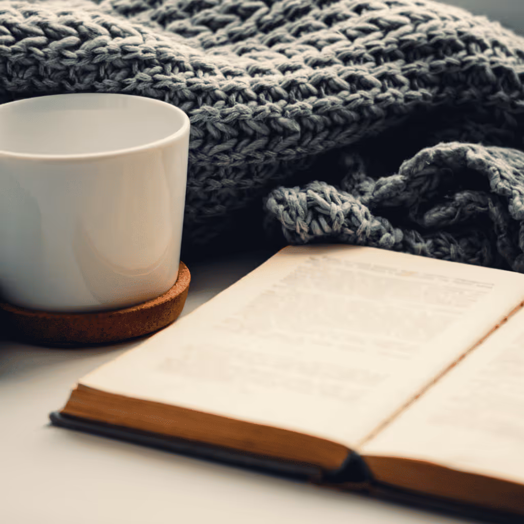 book, tea and a blanket
