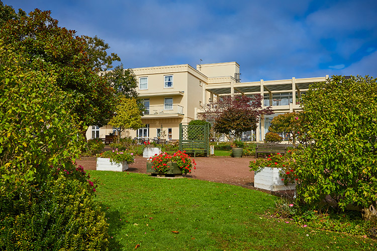 A great home setting in mature gardens