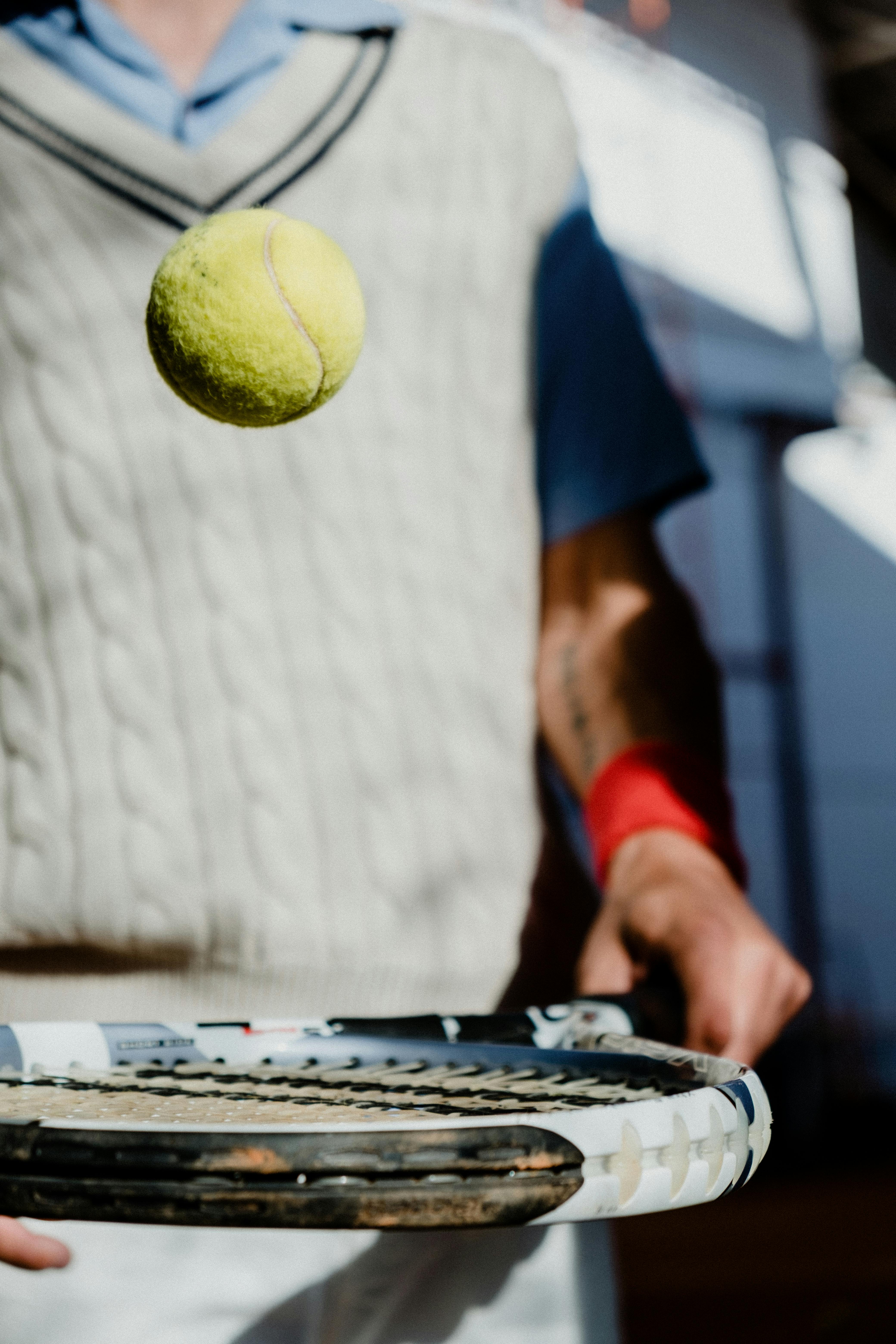 Tennis ball or racket stock image