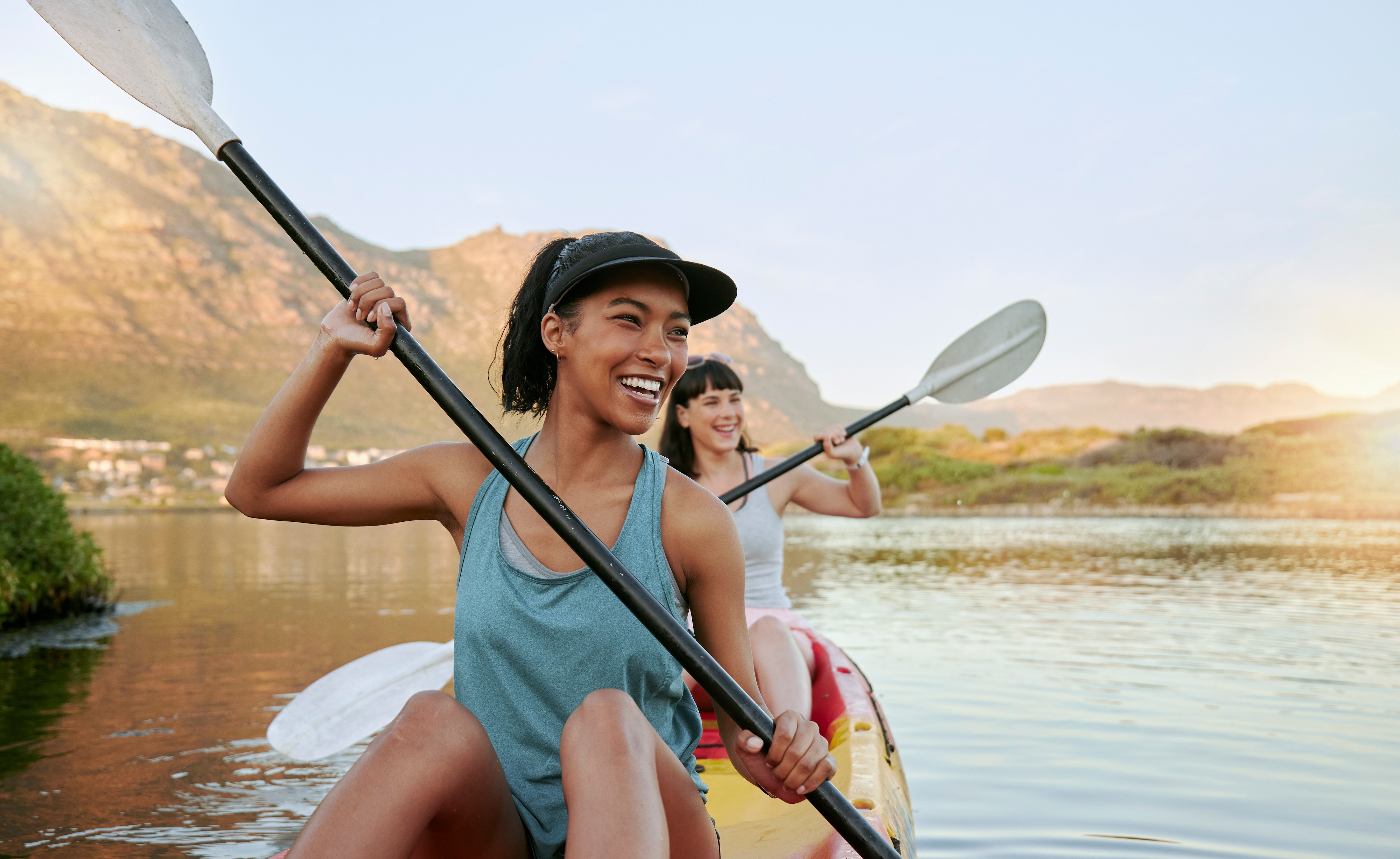 Friends kayaking photo stock image