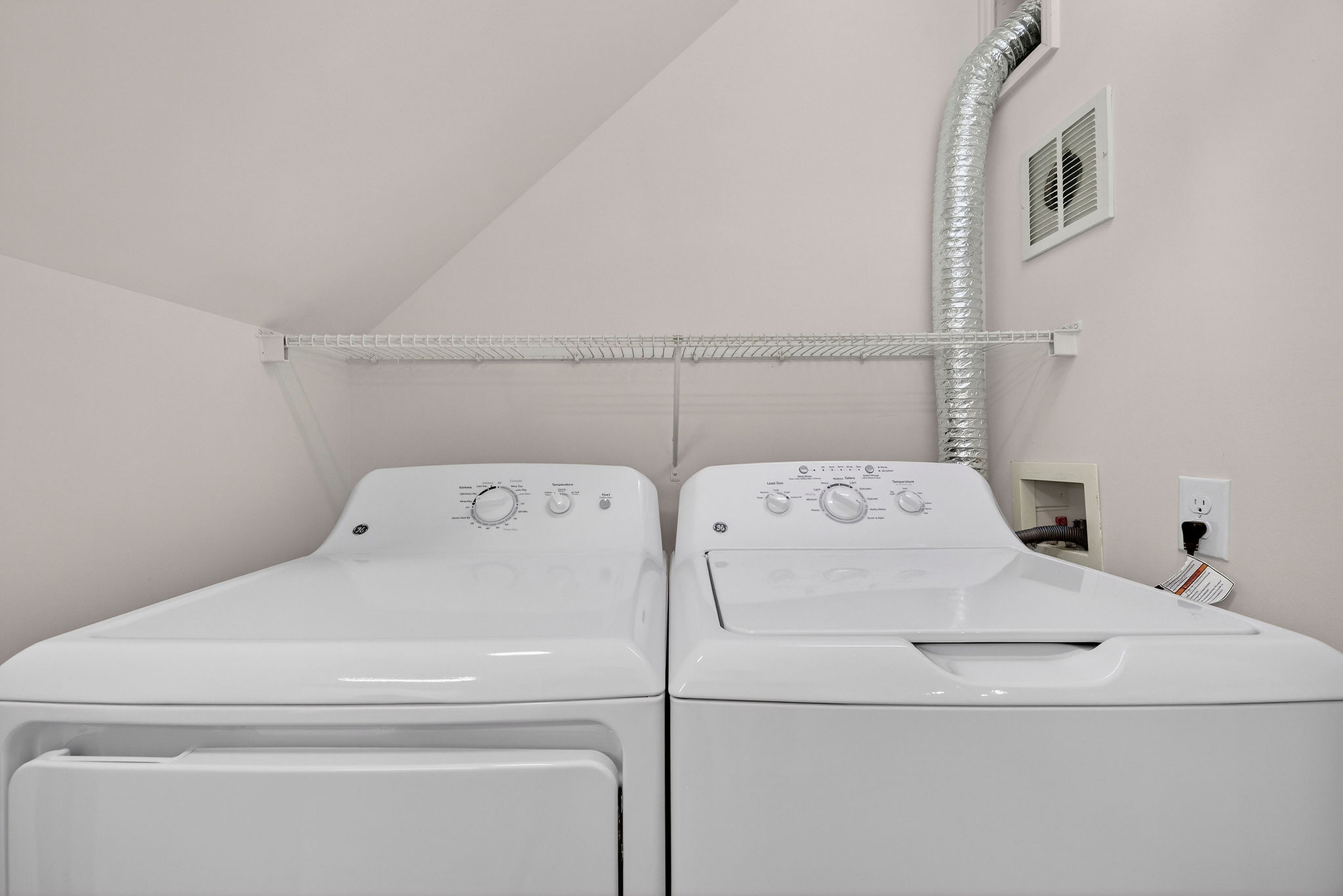 Primary bedroom with en-suite bathroom in Wilmington, NC.