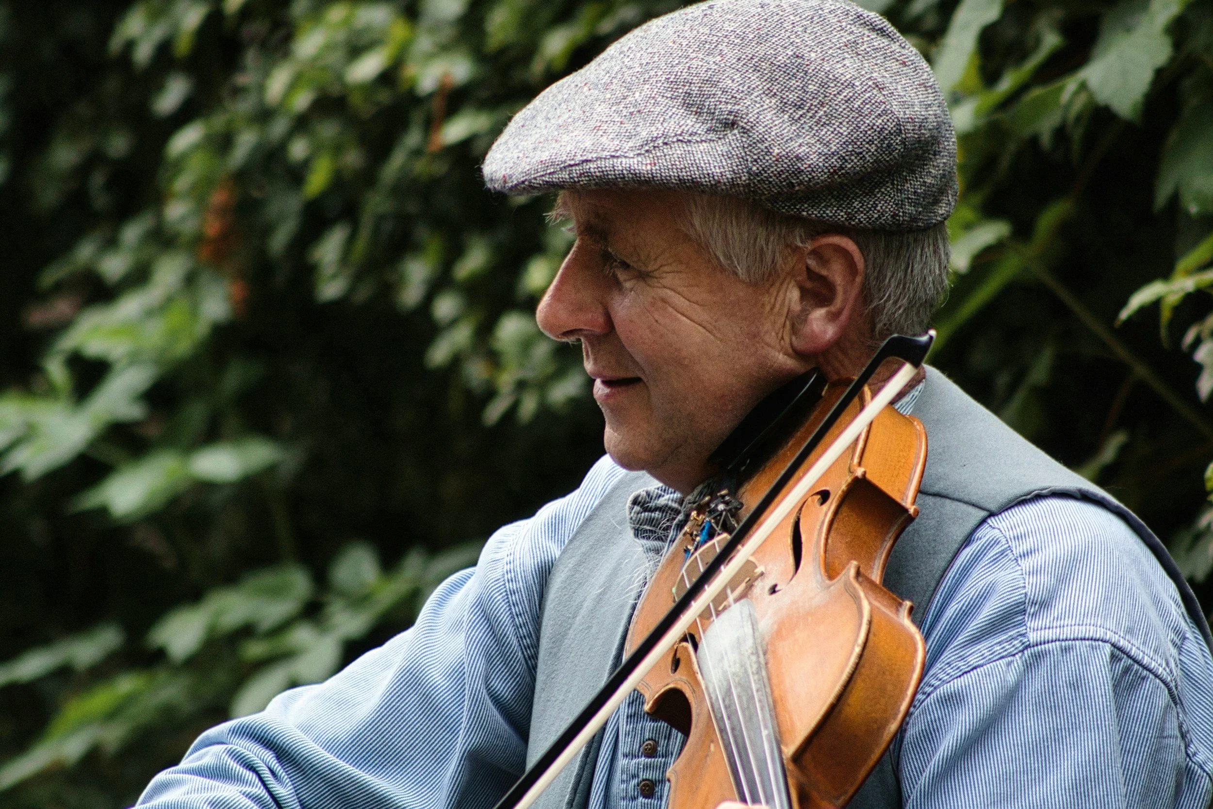 Irish fiddle musician playing traditional music