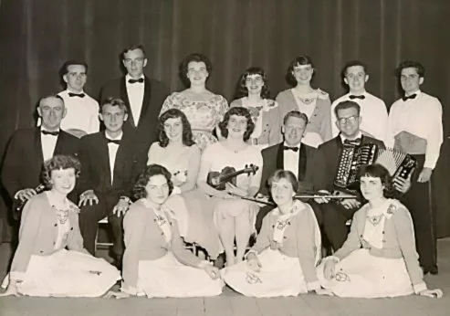 Group photo of IMA musicians, singers, and dancers on Ireland tour 1959