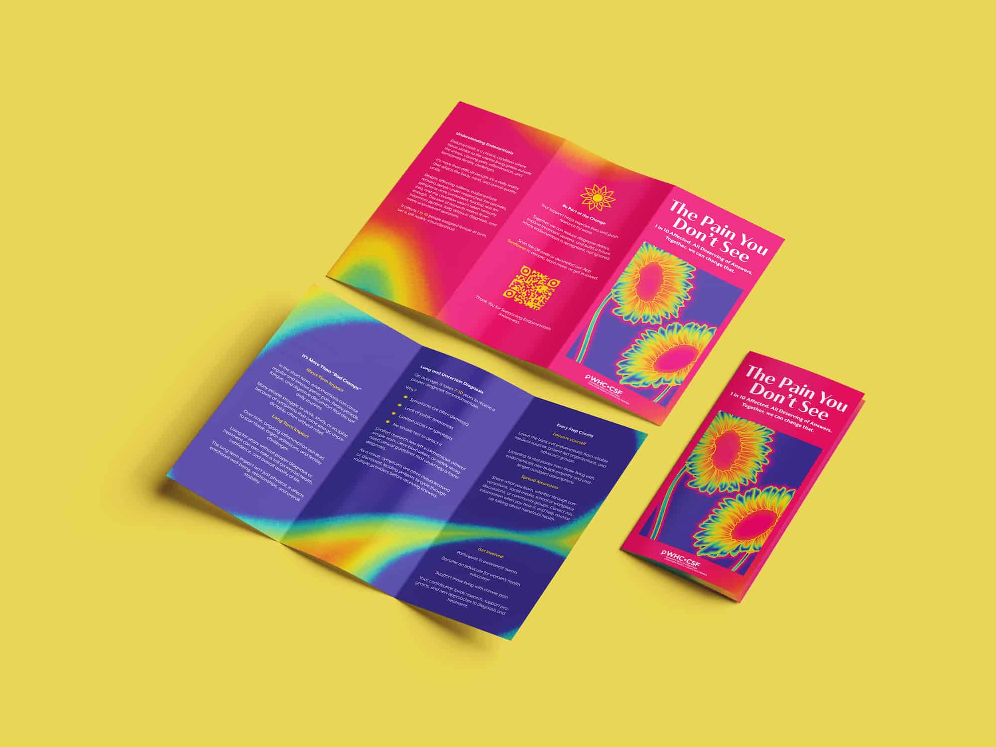 Trifold brochure titled 'The Pain You Don't See' featuring colorful thermal-style sunflower images on a pink and purple background, displayed open and folded on a yellow surface.