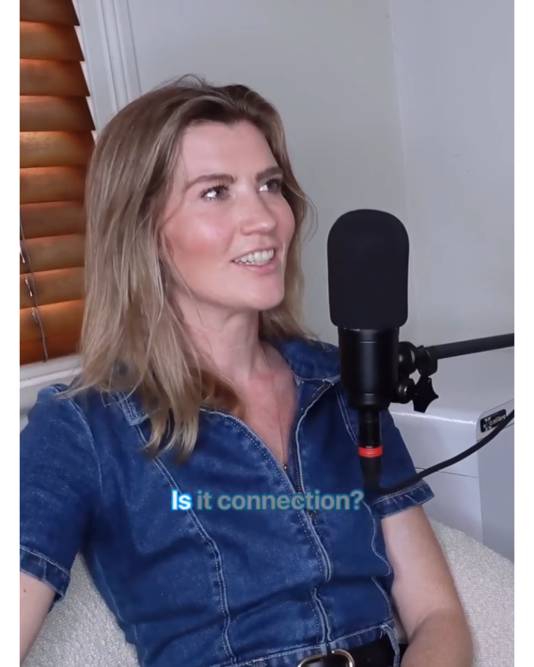 Image of Alice on a podcast